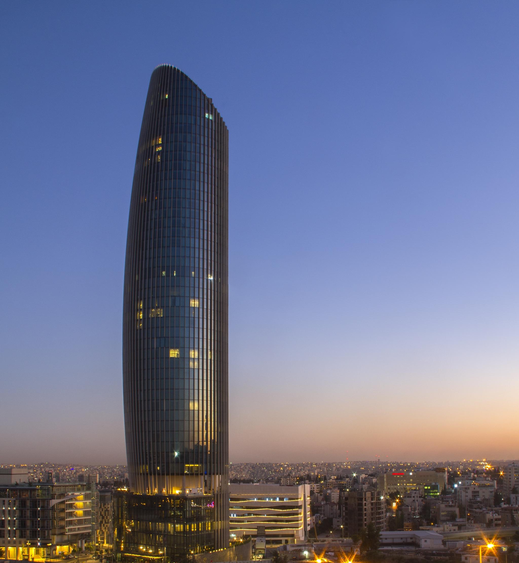 Amman Rotana Hotel Luaran gambar The tower at sunset